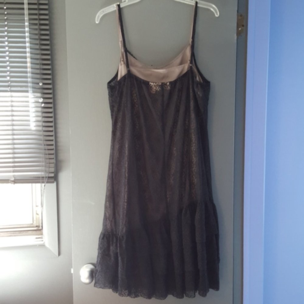 Stretchy black lace dress with attached (gray) slip